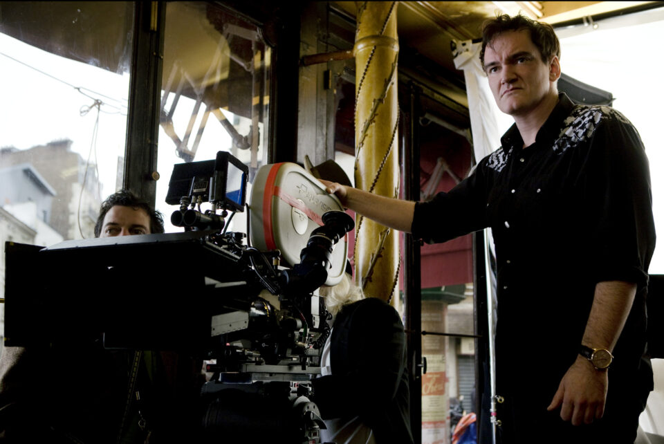 In this film publicity image released by The Weinstein Co., director Quentin Tarantino is shown on the set of, "Inglourious Basterds."  Tarantino was nominated Tuesday, Feb. 2, 2010 for an Oscar for best director for, "Inglourious Basterds." The 82nd Academy Awards will be presented on March 7. (AP Photo/The Weinstein Co., Francois Duhamel)